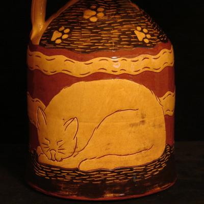 Lamp with Sleeping Cat Design