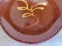 Small Redware Plate with "Feather" Motif