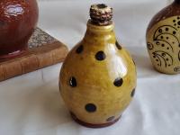 Redware Jug with Black Dots and Corn Cob Stopper