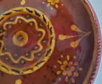 Redware 9 in. Plate with Floral Slip Decoration