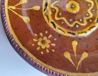 Redware 9 in. Plate with Floral Slip Decoration