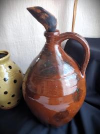 Redware Jug with Black Dapples and Spangled Decoration