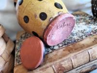 Redware 5 in Storage Jar with Black Dots and Acorn Finial
