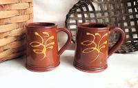 Two Slip-Decorated Redware Mugs with Feather Motif (a)