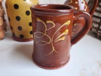 Slip-Decorated Redware Mug with Feather Motif