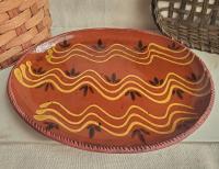 Redware Oval Platter with "Wave" Motif