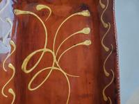 Redware Platter with Slipware Feather Decoration