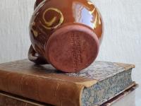 Redware Mug with Slipware Motif