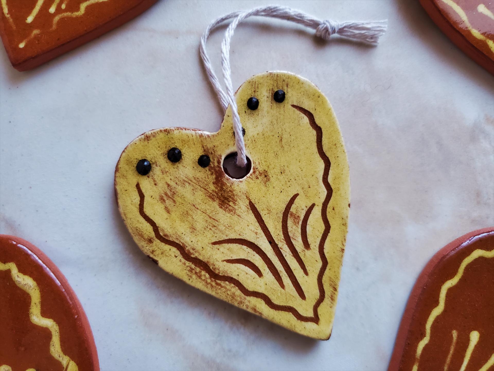 Set of Two Heart-Shaped Redware Ornaments by Garine of Kulina Folk Art, Slip Decorated