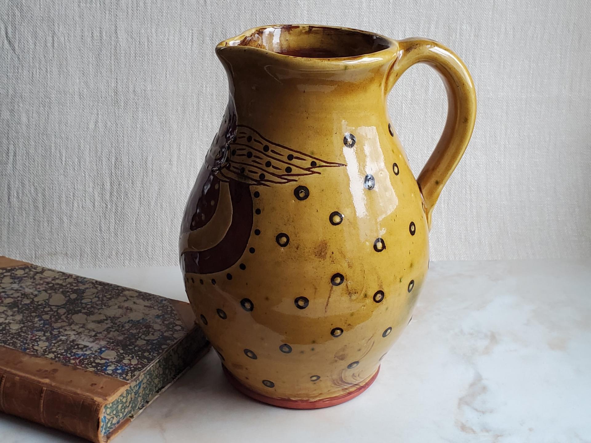 Redware Pitcher Angel with Wings Motif