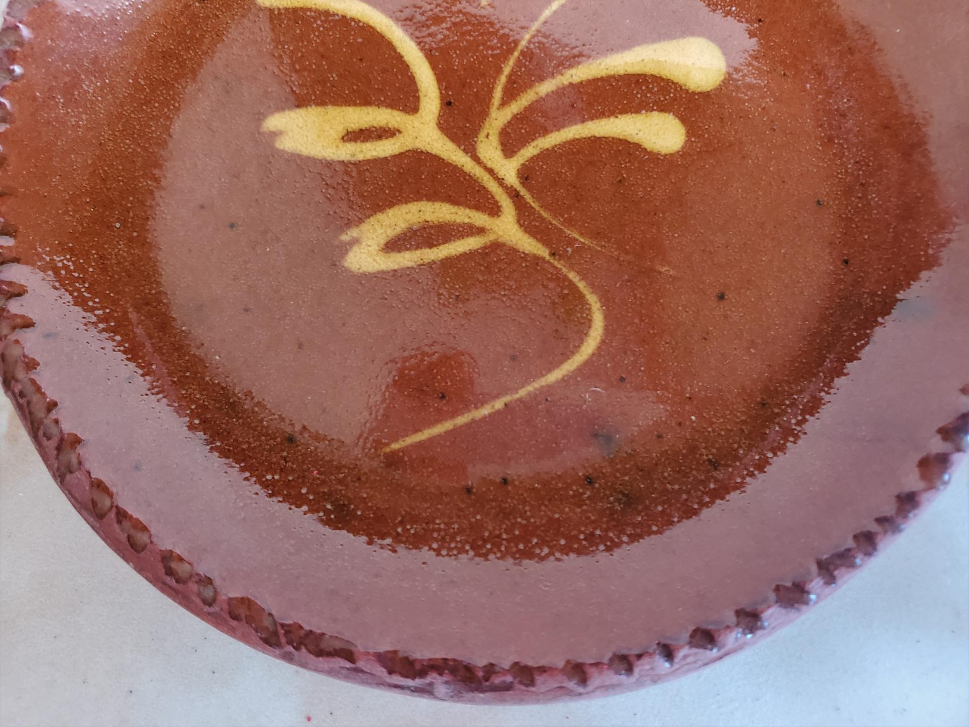 Small Redware Plate with "Feather" Motif