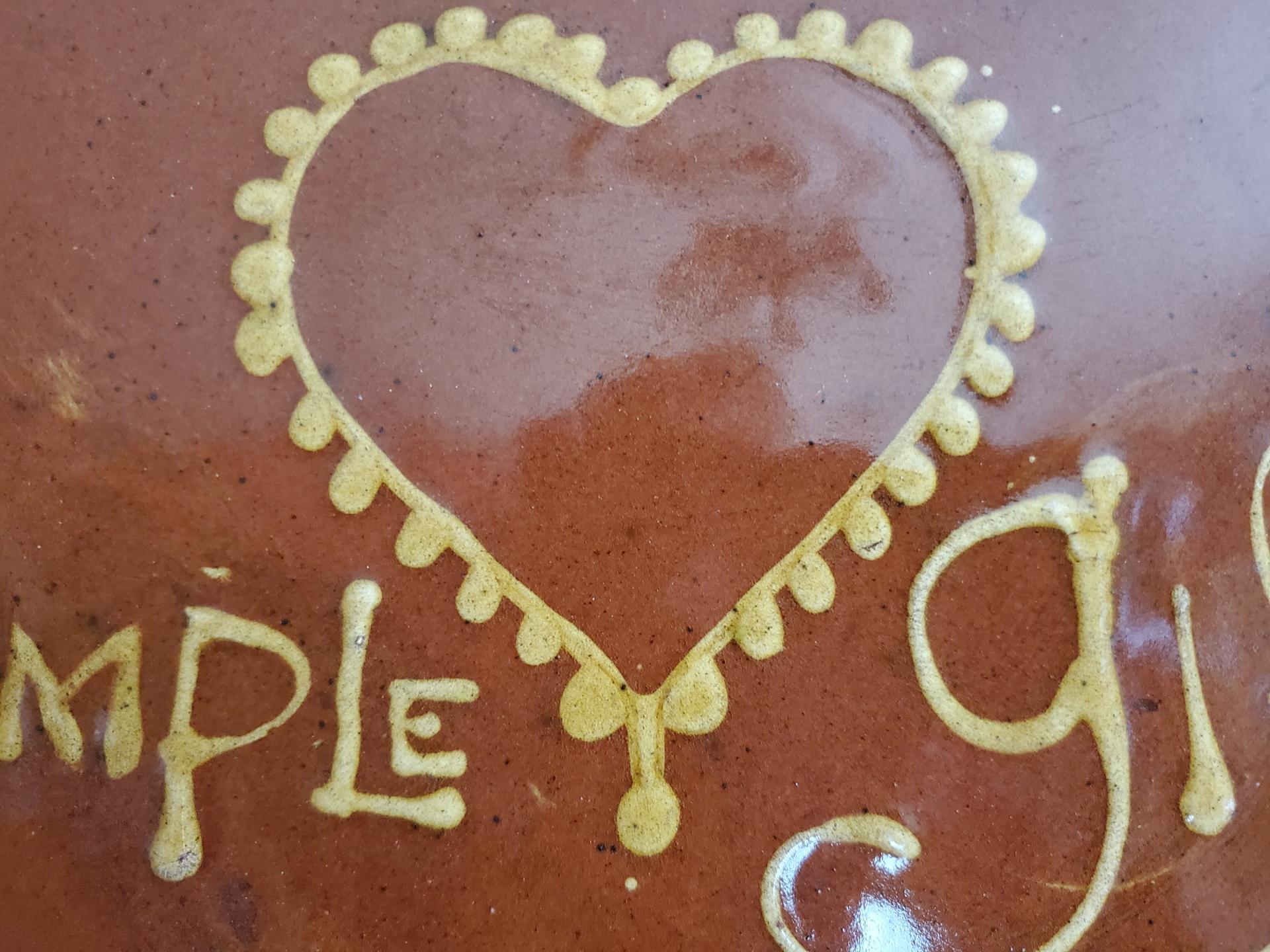 Oval Redware Platter with "Simple Gifts" motif