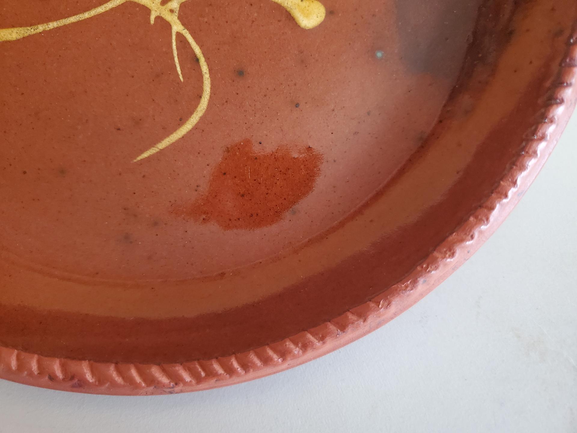 Redware 9 in. Plate, Feather Motif, Antiqued