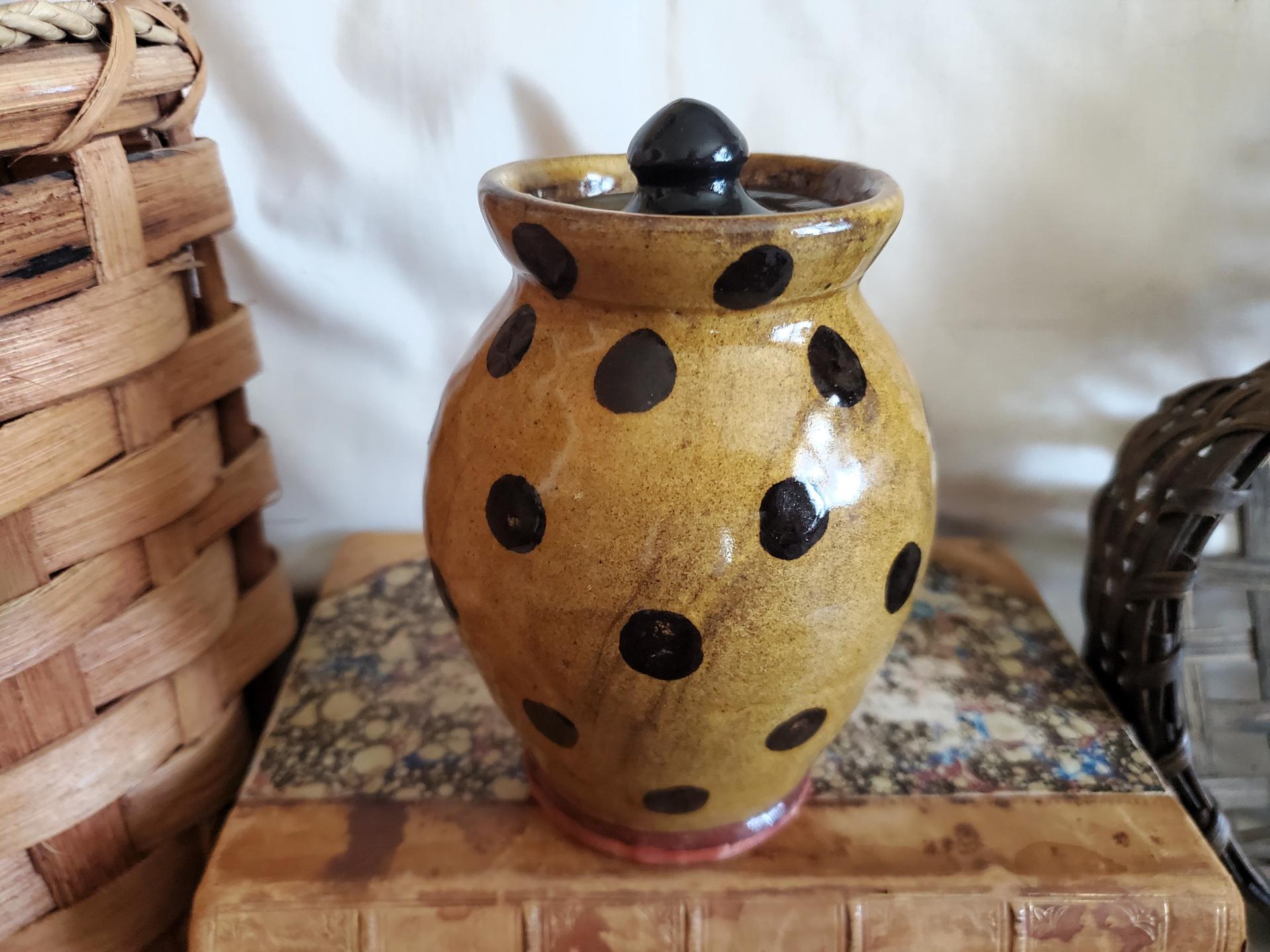 Redware 5 in Storage Jar with Black Dots and Acorn Finial