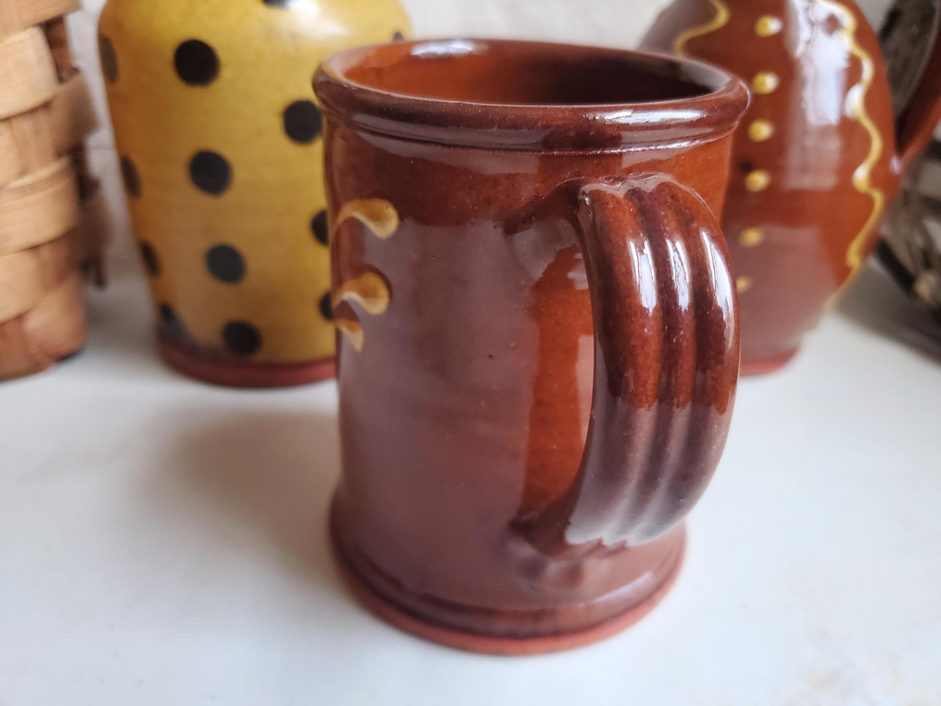 Slip-Decorated Redware Mug with Feather Motif
