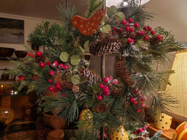 Snowy Pine Wreath with Red Berries and Redware Bird Ornament