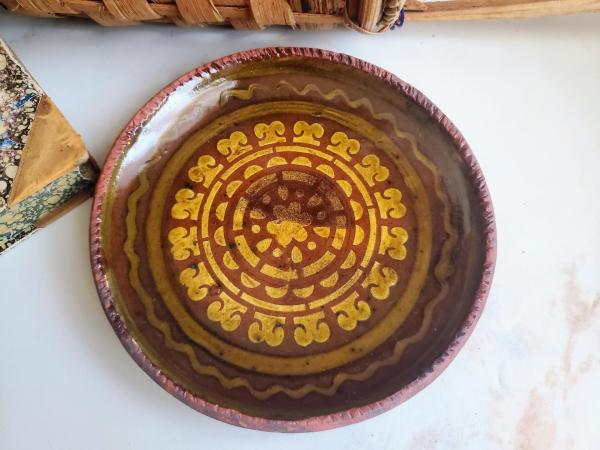 Redware 7 in. Plate with Green and Golden Slip Decoration