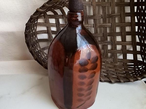 Redware Bottle and Stopper with Black Motif and Square Bottom